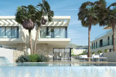 Modern villas con piscina y palmeras, parte del Font del Llop Golf Resort.